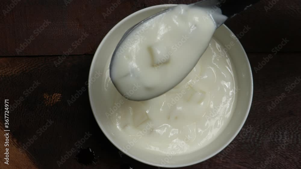 close up of a bowl of yogurt close up of a bowl of yogurt