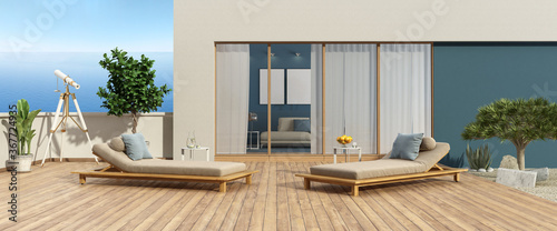 Obraz na plátně Beautiful terrace of a modern villa overlooking the sea