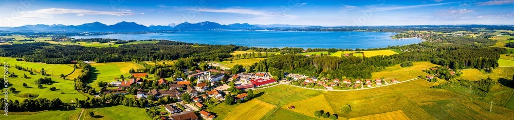Fototapeta premium Lake Chiemsee Ising Bavaria. Aerial Panorama. Landscape. Agriculture Fields