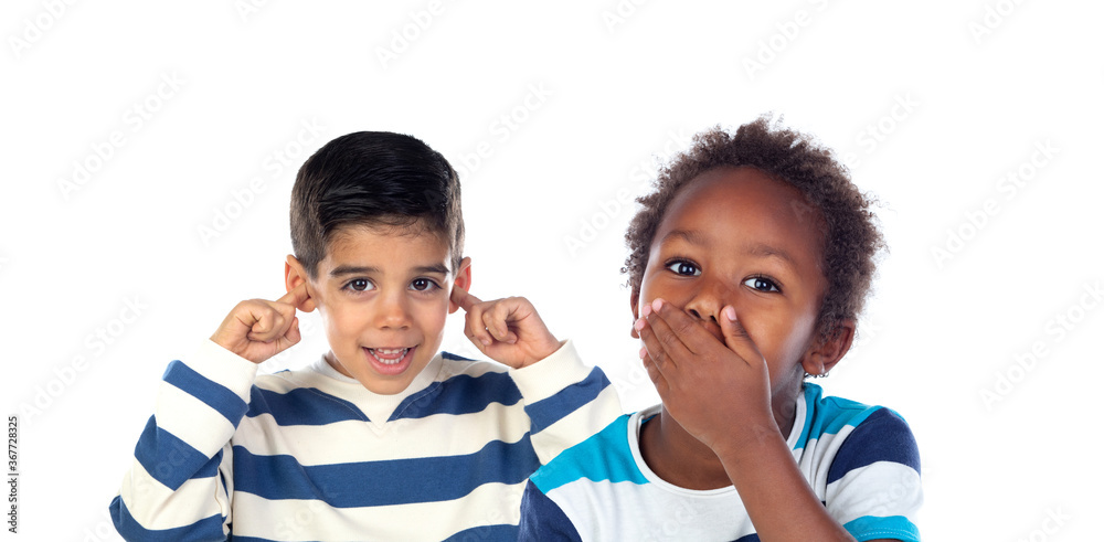 Two children excited covering the mouth and the ears Two children excited covering the mouth and the ears