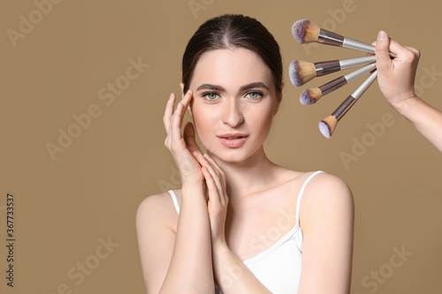 Young woman with makeup bru...