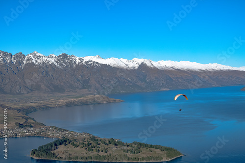 Lake Wakatipu in the mountains of Queenstown, New Zealand. Shaped like a lightning bolt, Lake Wakatipu is the third largest lake in New Zealand.