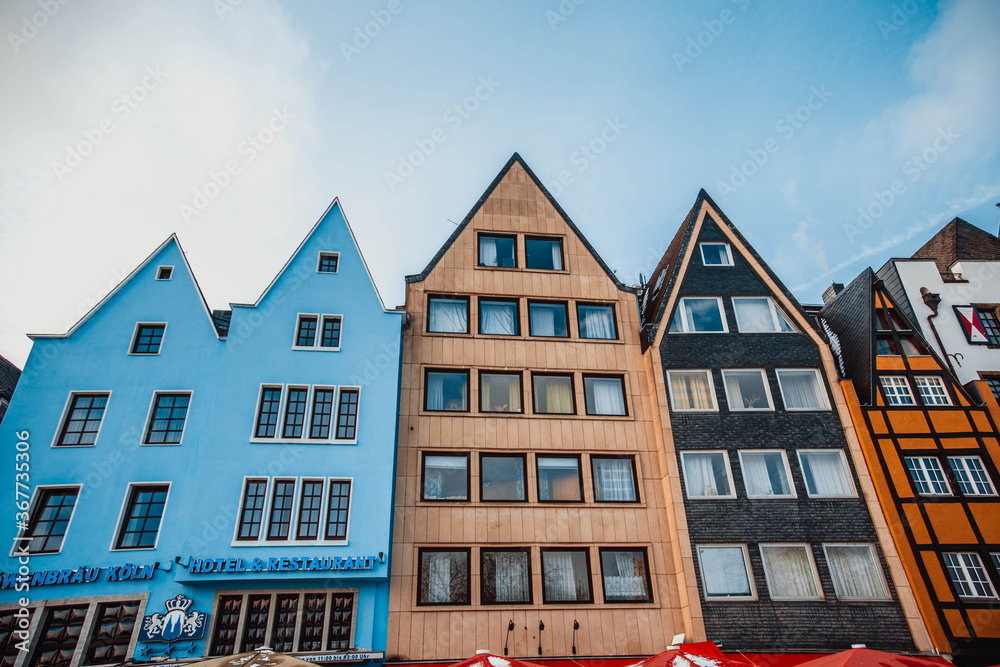Cologne, Germany: Famous Fish Market Colorful Houses and Gross St Martin Church