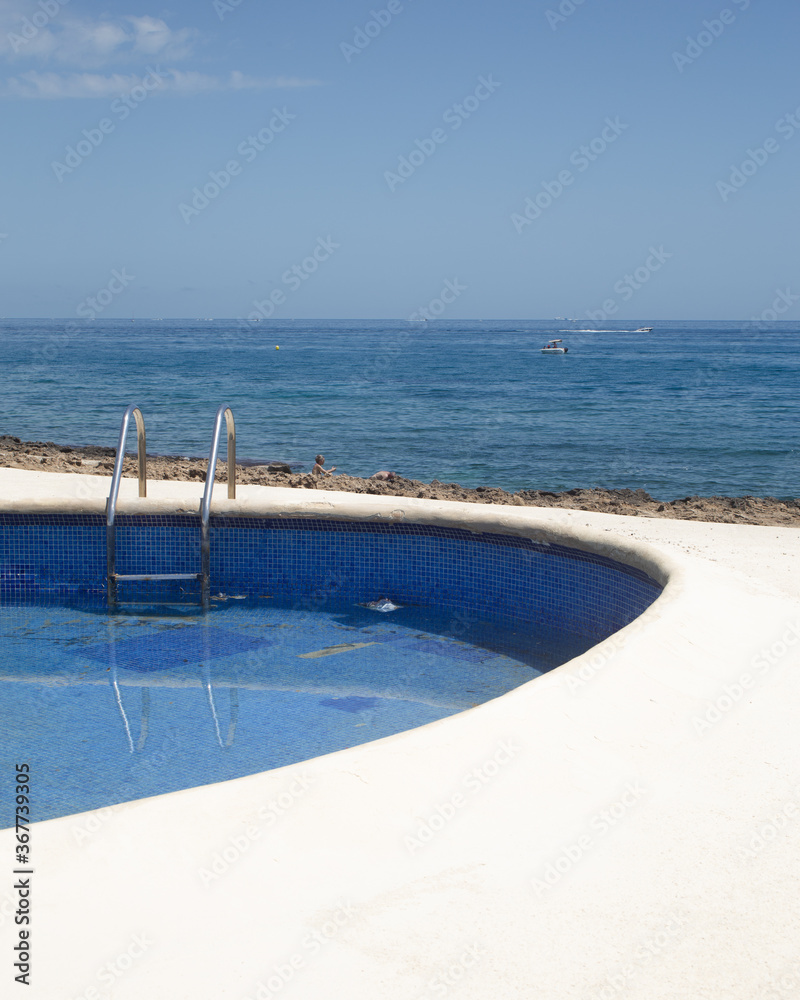 swimming pool in a tropical resort