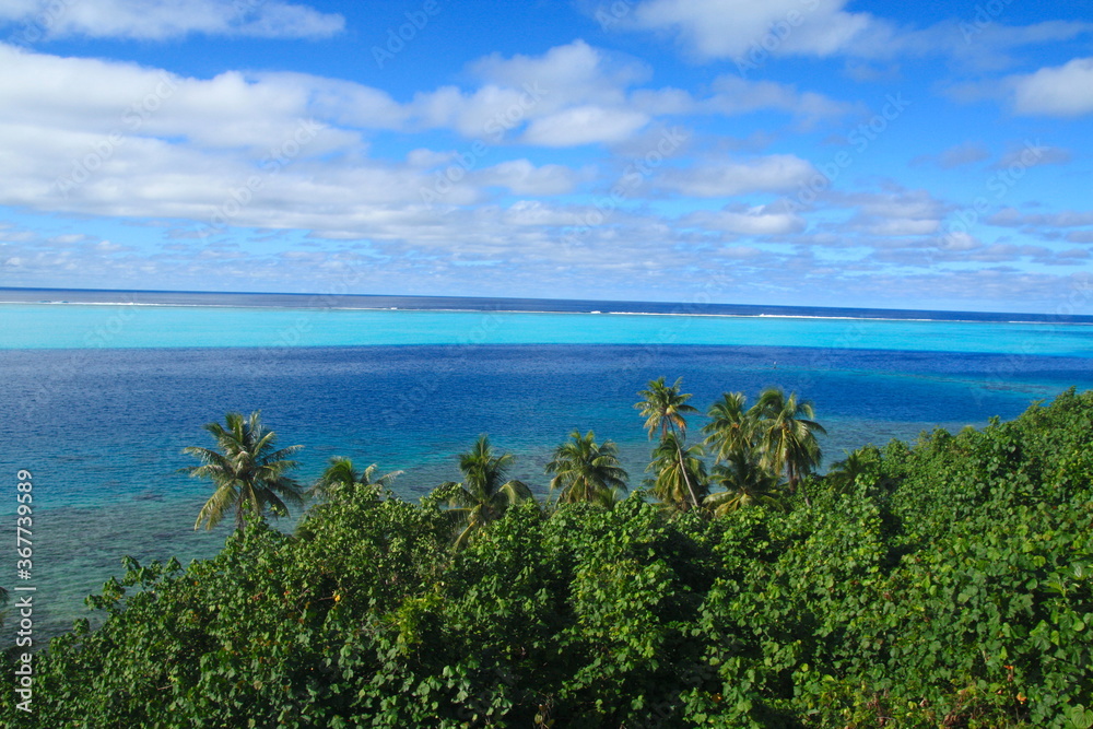 Beautiful panorama of a paradise beach with white sand and coco palm tree with turquoise water lagoon in Tahiti, Moorea island, French Polynesia. Beautiful panorama of a paradise beach with white sand and coco palm tree with turquoise water lagoon in Tahiti, Moorea island, French Polynesia.