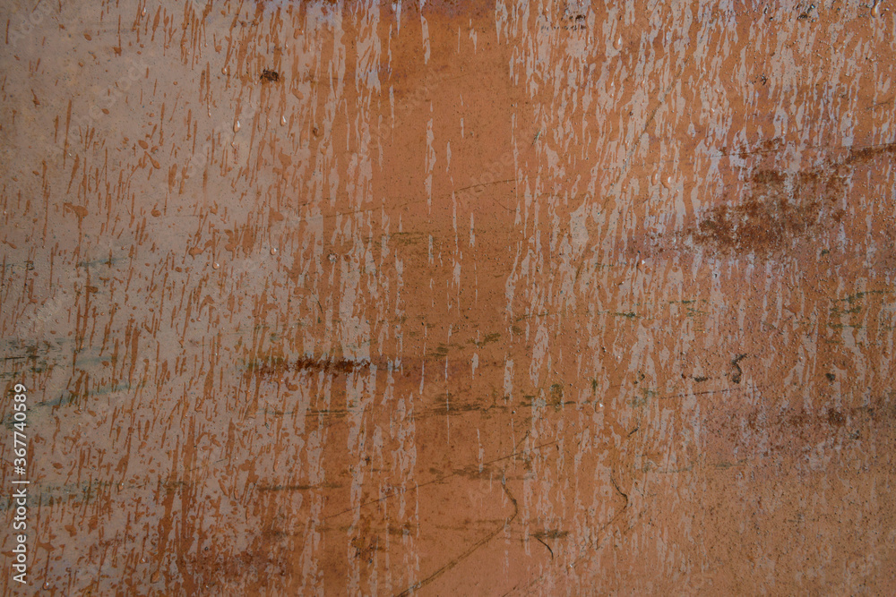 Fototapeta premium Surface of rusty metal sheet with water drops