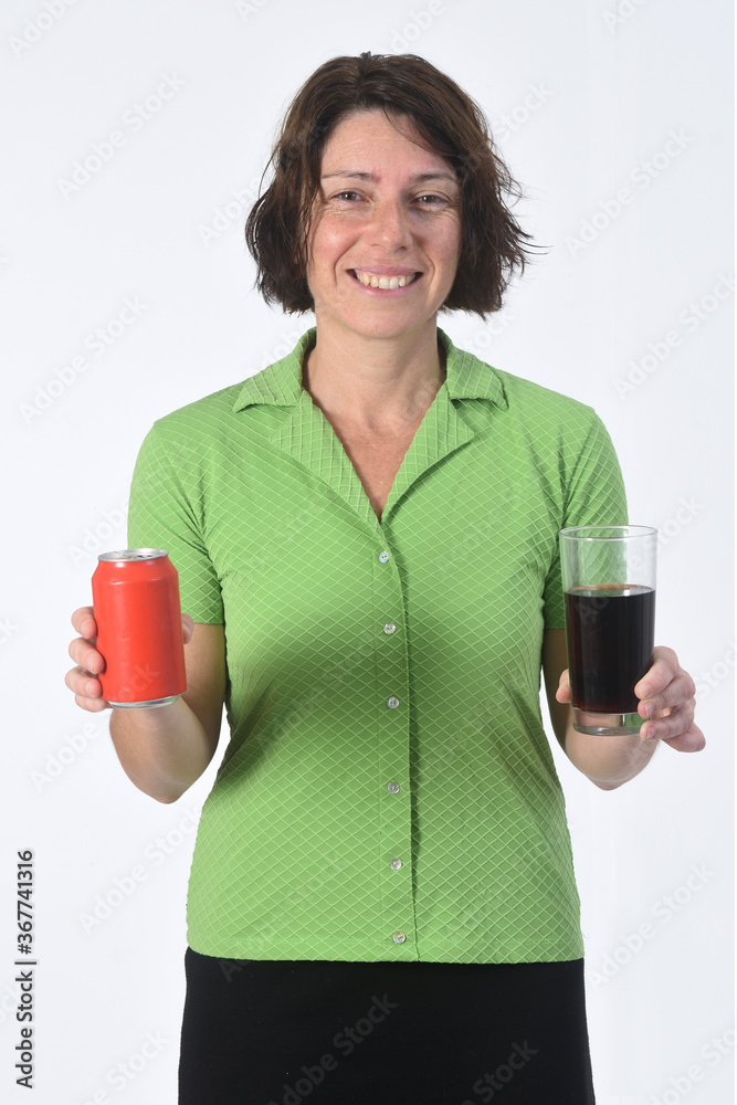 woman with a glass of coke soda on white background woman with a glass of coke soda on white background