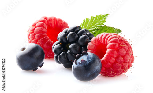Fresh berries with leaves on white background