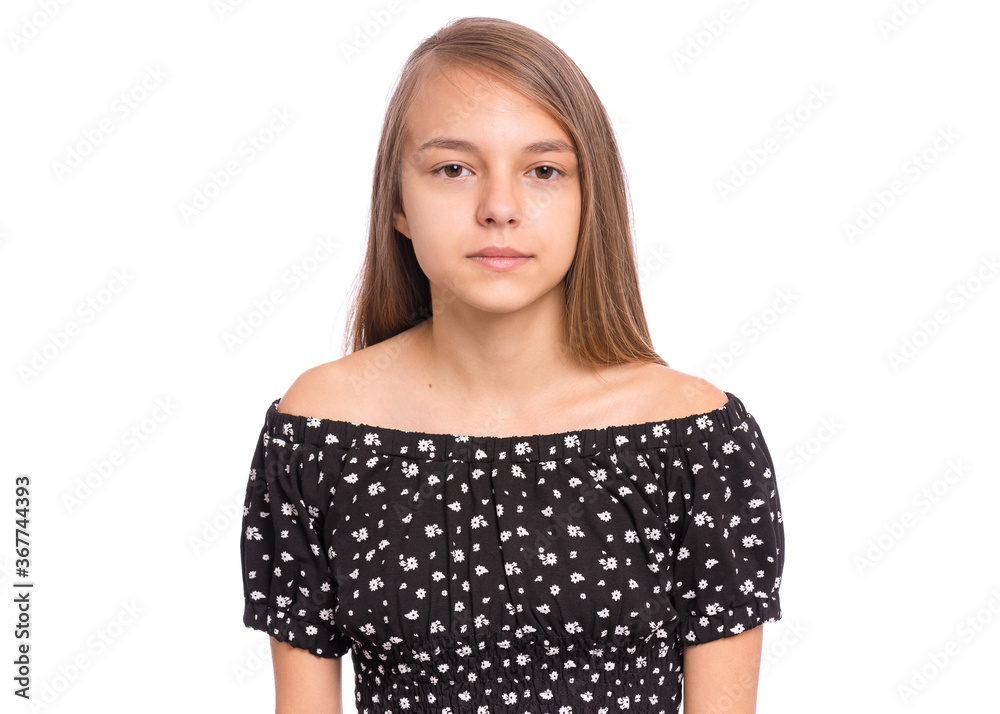 Beautiful teen girl smiling and looking at camera. Portrait of young pretty funny child, isolated on white background. Young happy teenager posing in studio. Beautiful teen girl smiling and looking at camera. Portrait of young pretty funny child, isolated on white background. Young happy teenager posing in studio.