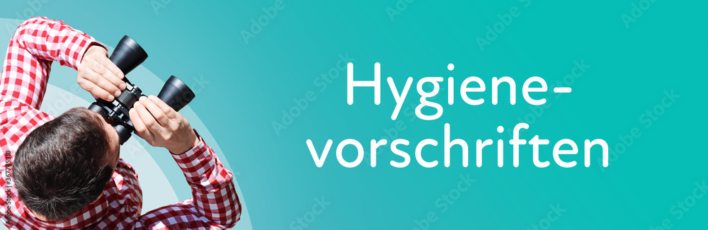 Fototapeta premium Hygienevorschriften. Mann mit Fernglas aus Vogelperspektive. Beobachtung, Draufsicht, Panorama. Business Text auf blau. Statistik, Wirtschaft