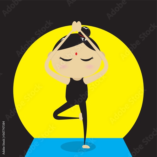 woman practicing yoga in tree pose