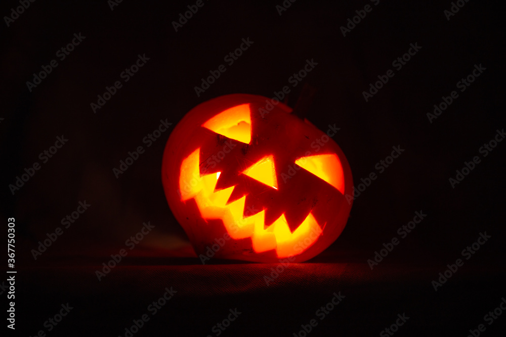 Scary halloween pumpkin for holiday on blue background