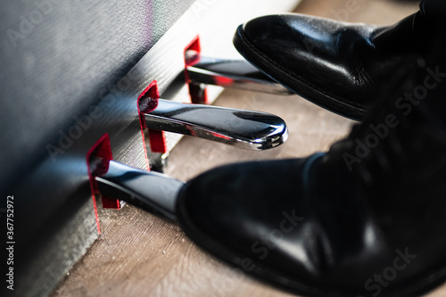 shoes piano pedals with wood floor