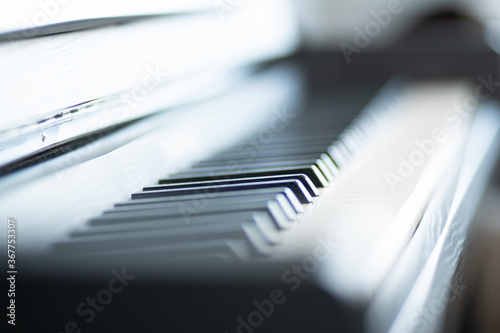 close up of piano keys black and white