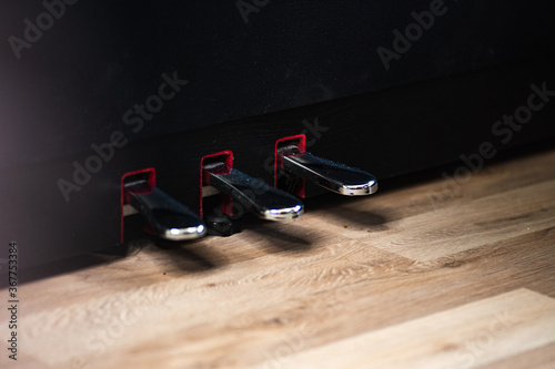 piano pedals with wood floor