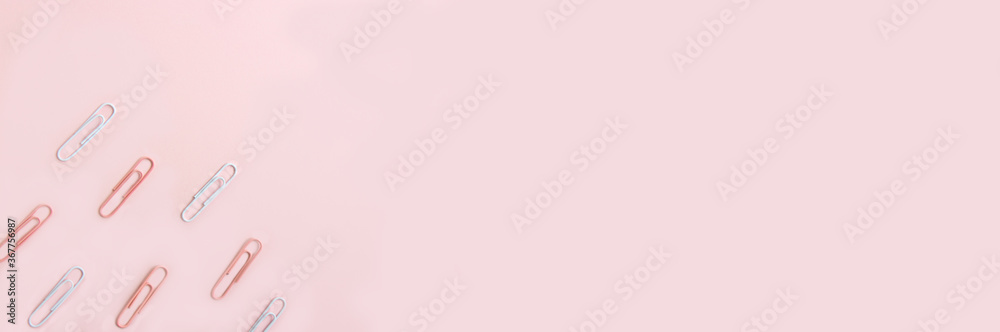 School stationery and supplies on a pink background with space for caption. Back to school, homeschool creative workspace. Minimalistic set of colorful stationery. Flat lay School stationery and supplies on a pink background with space for caption. Back to school, homeschool creative workspace. Minimalistic set of colorful stationery. Flat lay