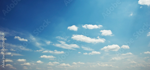 The beautiful blue sky with lots of clouds in the daytime