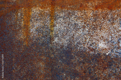 Old metal golden background. Golden grunge metal background and texture with scratches and cracks.