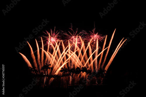 Colourful fireworks explosion displays on black background, isolated pattern design, asset for compostion photo