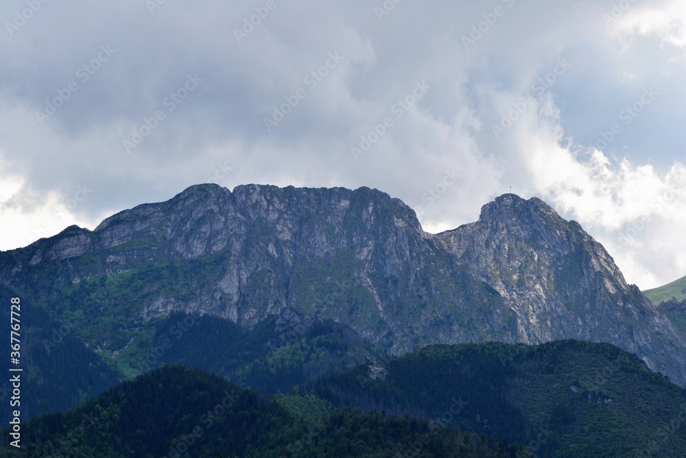 Giewont, mountain massif in the Tatra Mountains of Poland. It comprises three peaks: Small Giewont, Great Giewont and Long Giewont. 