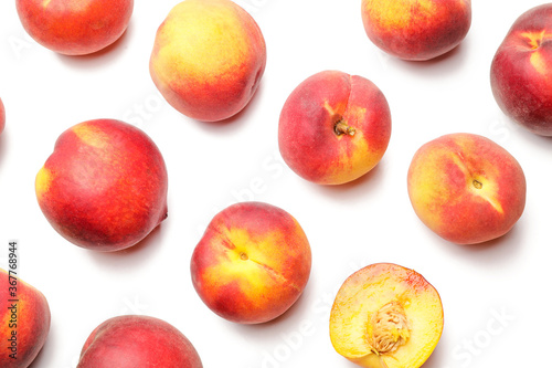 Many ripe peaches on light background