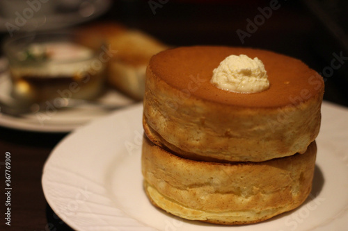 Close up of a plate of delicious baked fluffy Japanese souffle pancakes, Osaka, Japan, soft focus