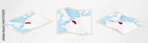 Folded map of Belgium in three different versions. photo