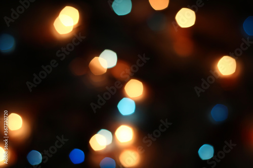 Blurred bokeh in warm colors. Lights and highlights for the background.