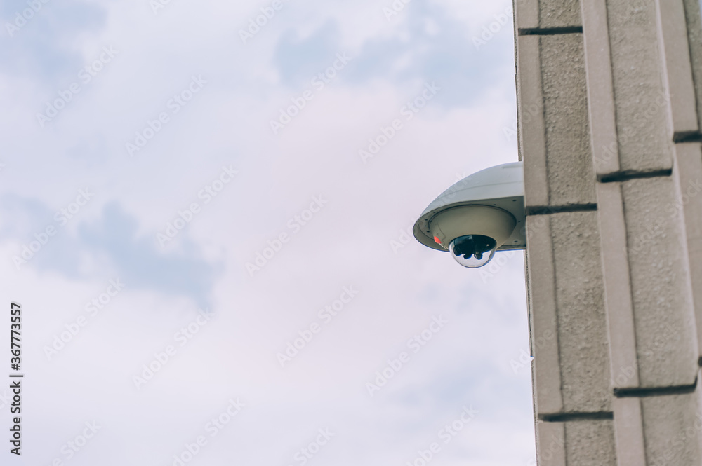 City web camera for surveillance on the background of the building and the sky. City web camera for surveillance on the background of the building and the sky.