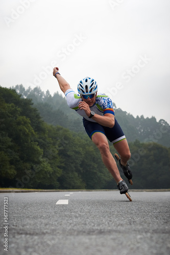 A man during a rollerblade competition photo