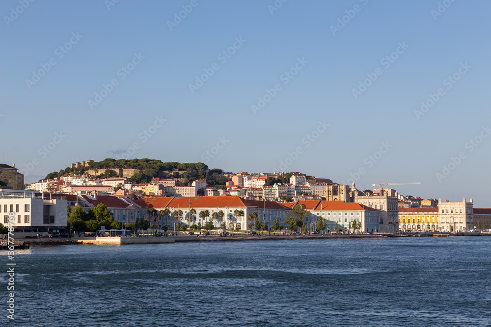 View of the historic waterfront of Lisbon from the Tejo river