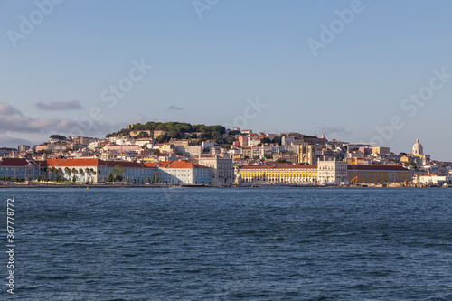 View of the historic waterfront of Lisbon from the Tejo river © sytnik