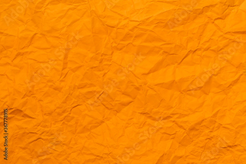 crumpled orange paper for orange background