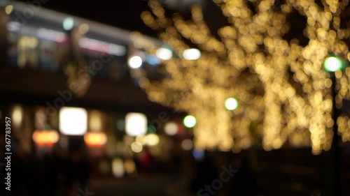 Blur Christmas light on tree in Tokyp city street beautiful holiday decoration photo