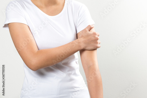 Wallpaper Mural Women holding hands in arms, like pain on a white ground.
 Torontodigital.ca