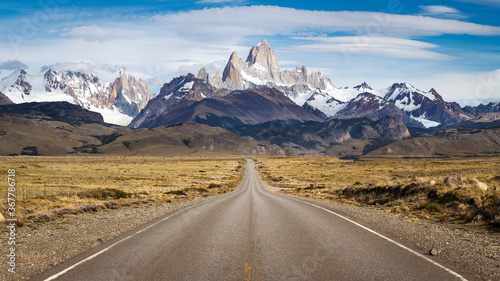 Panoramic view of the main street leading to the great mountains of Cerro Torre and Fitz Roy in El Chalten, Argentina