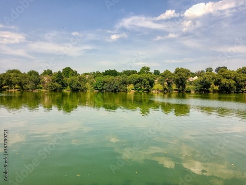 Fototapeta Naklejka Na Ścianę i Meble -  Nature.Beautiful summer landscape, trees, pond, river.