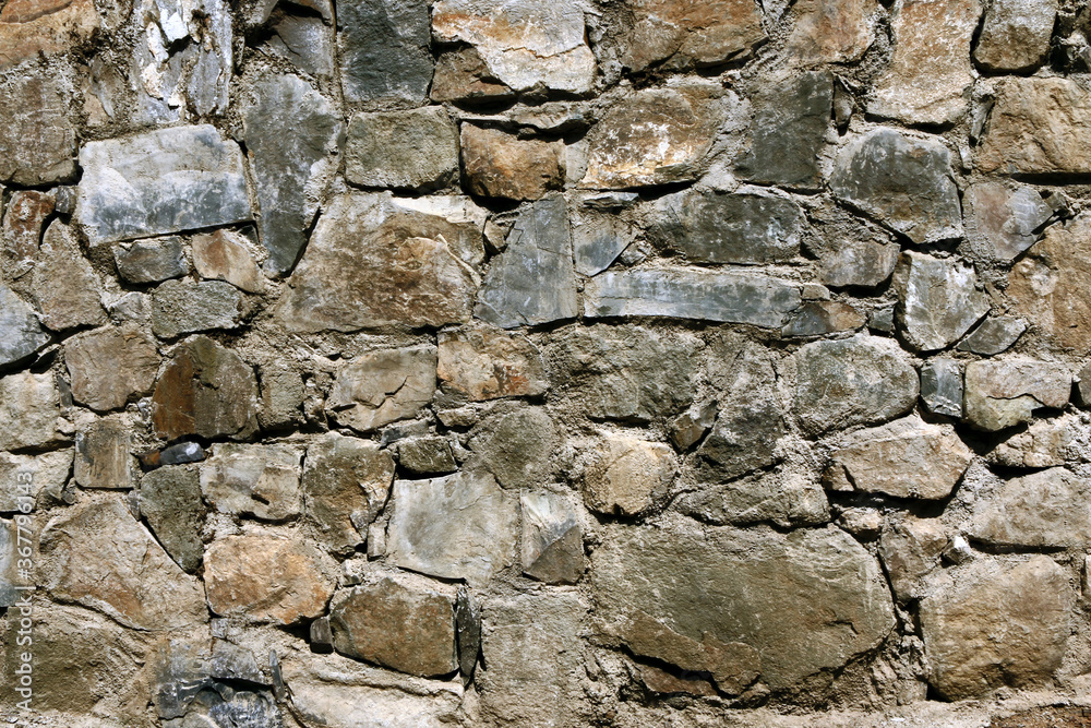 Stone wall background. Natural stones wall texture. Old castle stone wall texture background. Stone wall background. Natural stones wall texture. Old castle stone wall texture background.