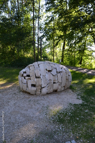 Sculpture egg from stone blocks in the park