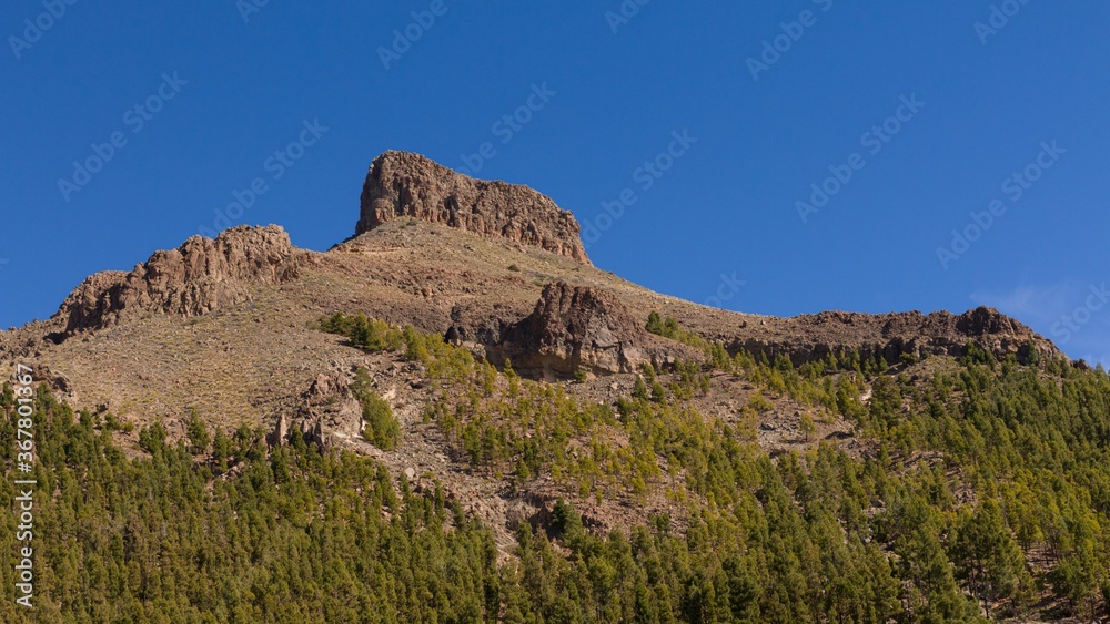 sunny landscape with table mountain in front of a dark blue sky on island Teneriffe