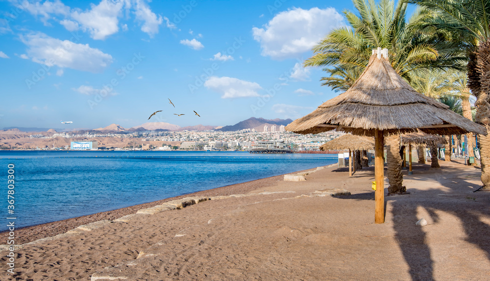 Sandy beach in Eilat - famous tourist resort and recreational city in Israel and Middle East
