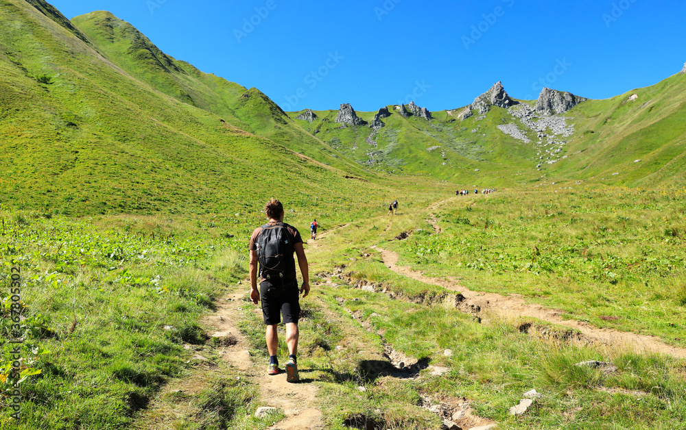 man hiking Sancy Puy in France