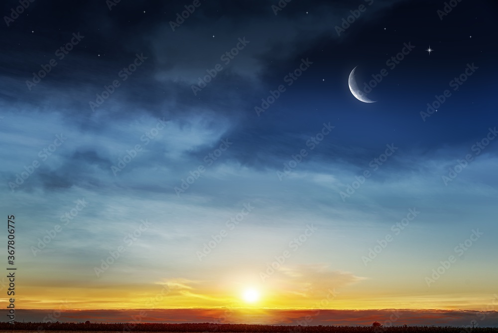 a young month in the clouds. background generous Ramadan