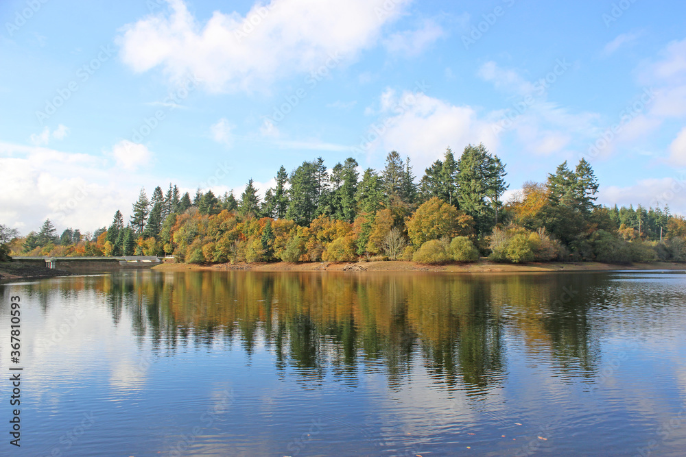 Reflections in Tottiford Reservoir, Devon, in Autumn
