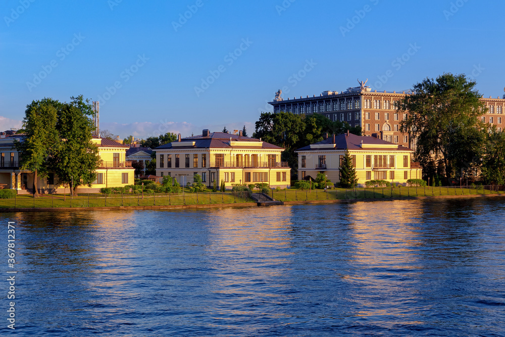 St. Petersburg, Russia - July 27,  2020: Luxury real estate on the banks of the river Srednaya Nevka, Deputatskaya street 15