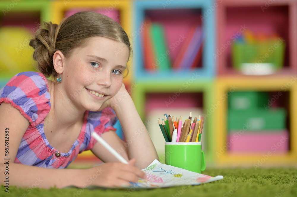 Portrait of beautiful girl drawing picture at home Portrait of beautiful girl drawing picture at home