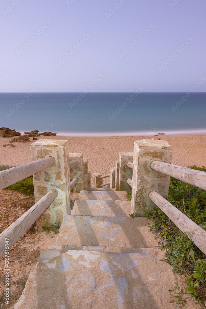 access with stairs to a beach in Conil de la Frontera in Cadiz. Spain