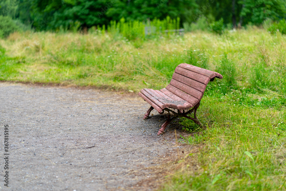 Old wooden bench for rest. Dirty shabby pew in park. Old wooden bench for rest. Dirty shabby pew in park.