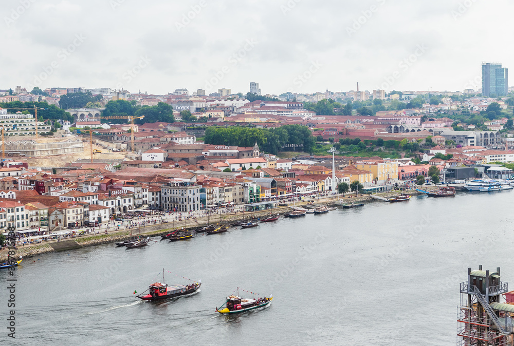 View of the Vila Nova de Gaia with the Rio Duoro River  from Dom Luis I bridge, Porto, Portugal.