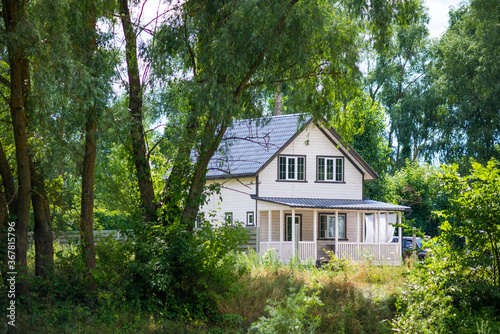 Classical wooden house in the forest